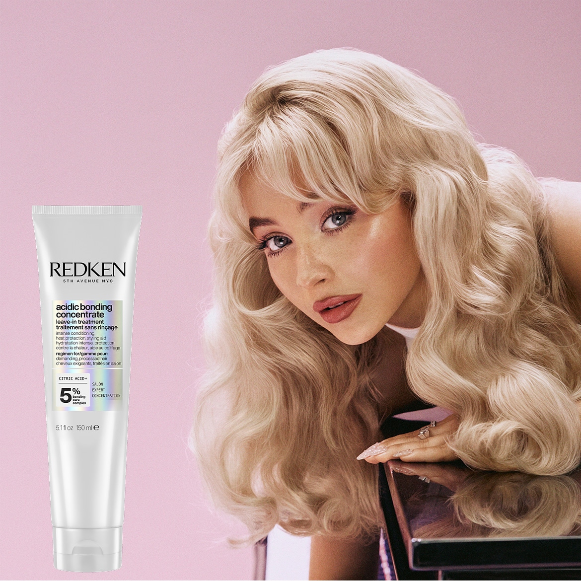 Ontdek Redken's Acidic Bonding Concentrate leave-in treatment in een witte tube, ideaal voor veeleisend haar, met intense hydratatie en hittebescherming voor een salonwaardige verzorging.