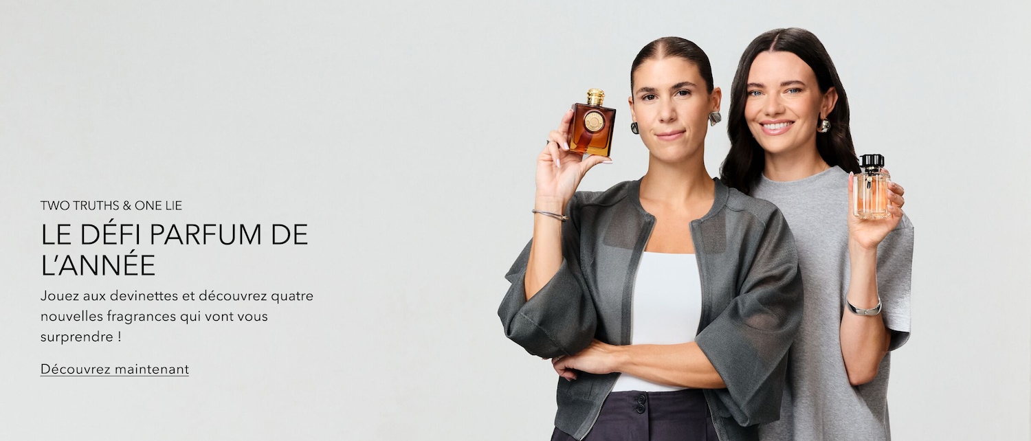 Deux femmes souriantes tiennent chacune un flacon de parfum, avec le texte "TWO TRUTHS & ONE LIE LE DÉFI PARFUM DE L'ANNÉE" et "Découvrez maintenant" pour découvrir quatre nouvelles fragrances.